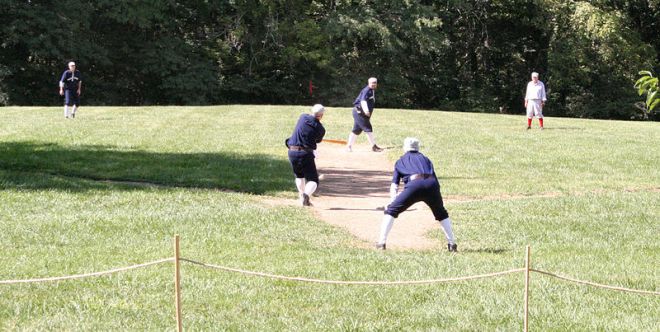The above image shows a practice with a few members of the 1886 White River Base Ball Club of Conner Prairie Living History Museum. Pictured are, from left to right: "Thunderbolt," "Digger" (hitting), "Hay Wagon" (pitching), "Scooter" (catching), and "Steamboat."