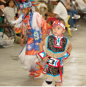 One of the ten cutest kids in a May, 2014 story about Indian pow-wows. For more up-to-date news about native Americans, click on the image.